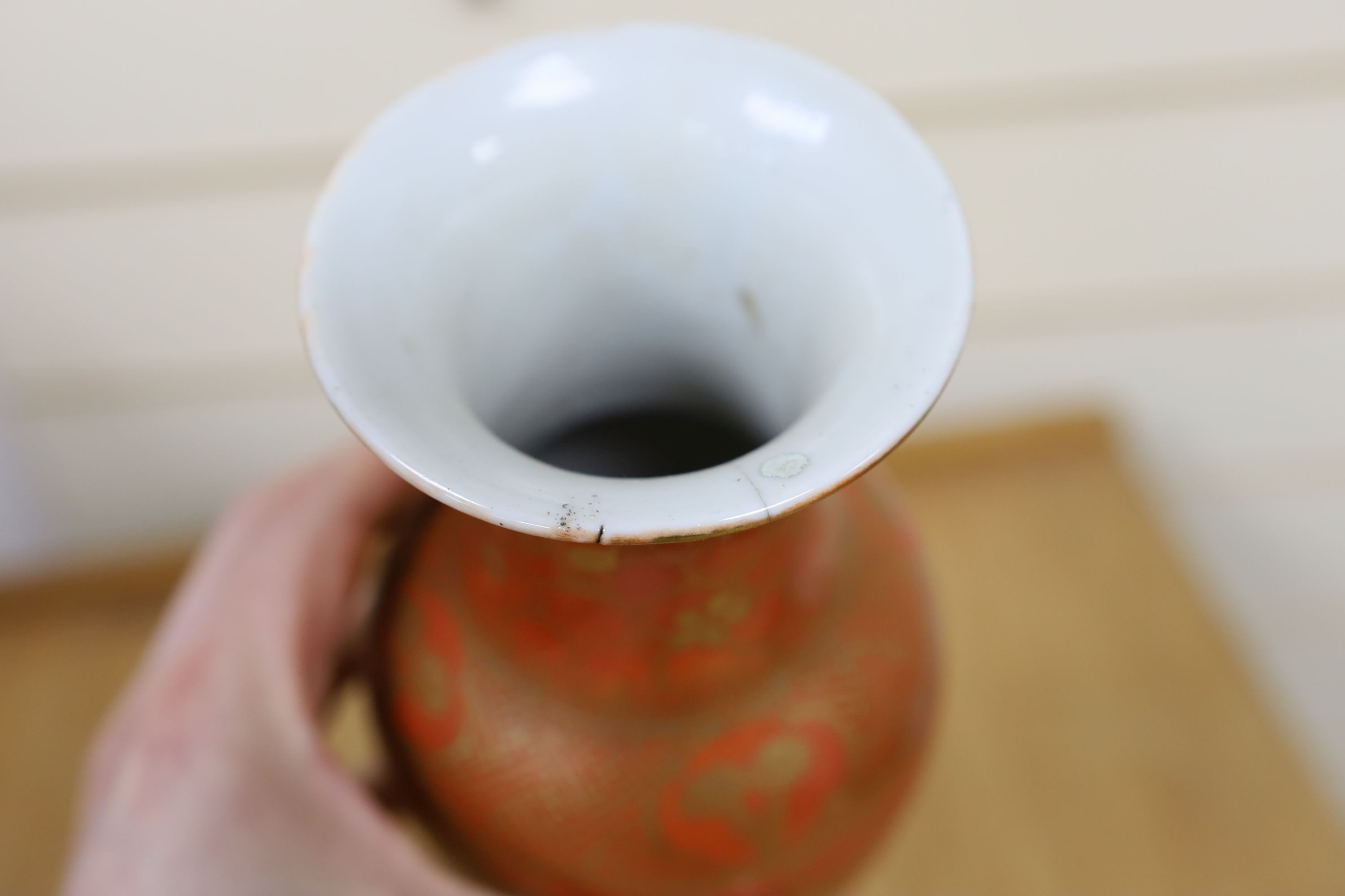 A Chinese blue and white gourd vase with landscape decoration, a similar blue and white sleeve vase and a Japanese Kutani vase